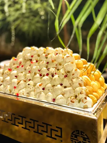Another stunning presentation of my Kesariya Dahi Bhalla. The vibrant yellow from the saffron-infused yogurt makes this dish a visual delight.