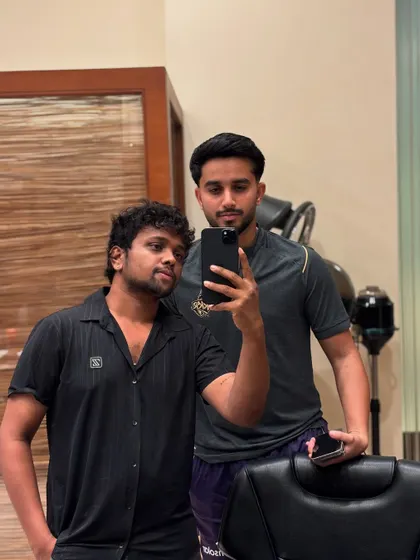 A final check in the mirror with Mayank Dagar. The client's satisfaction is my top priority.