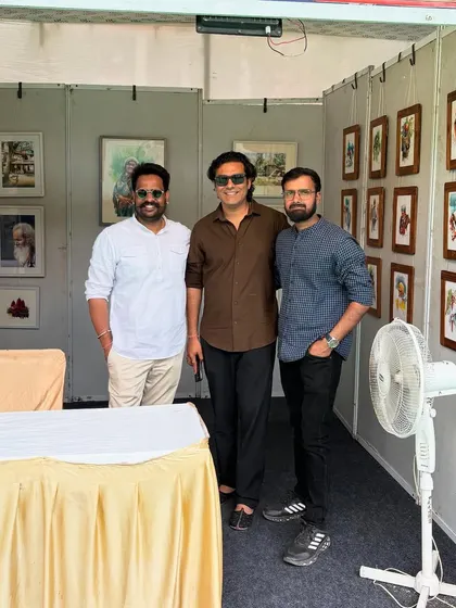 With friends and fellow artists at the Jaipur Kala Mela. These events are a great way to connect with the art community.