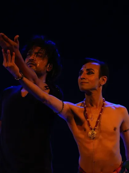 An intimate and expressive moment between two lead dancers in "TATSAMA TADBHAVA." This close-up reveals the intricate eye makeup and the deep connection conveyed through their performance.