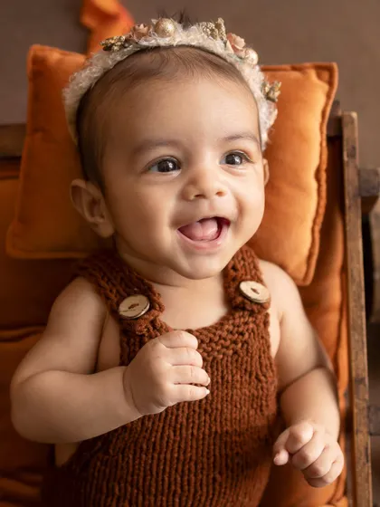 The happiest pumpkin in the patch. This baby's infectious giggle made this autumn-themed shoot so special.