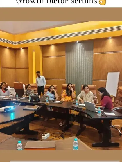 Discussing growth factor serums with colleagues. These advanced topicals are an important part of modern treatment plans for anti aging and skin repair.