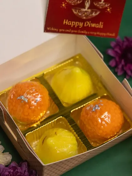 A closer look at our Mithai Soaps, featuring Motichoor Ladoo and Kesar Peda shapes. These soaps are a fun and festive addition to any Diwali hamper and come with a 'Happy Diwali' card.