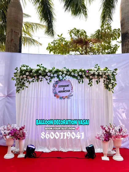 Our decorations can be adapted for any venue, including outdoor spaces. This clean and simple setup is perfect for a daytime garden engagement ceremony.