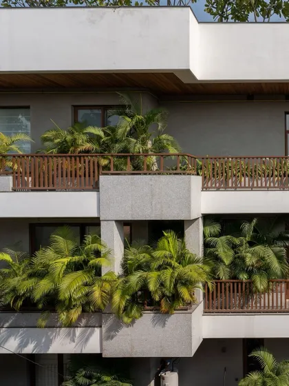These balconies, filled with plants, act as a green buffer for the building. They not only add to the aesthetic but also help cool the air and provide a pleasant micro-environment for residents.