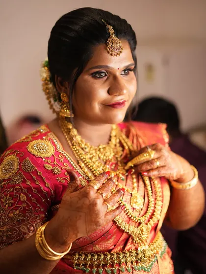 My favourite client Shruthi at her Valaikaappu (baby shower). I draped her beautiful red silk saree to be comfortable and elegant, ensuring she felt special on her big day.