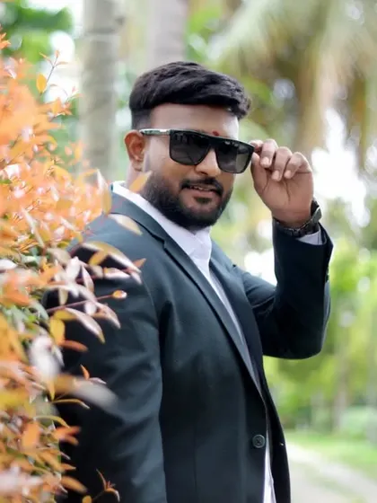 A cool and confident portrait of the groom. We work to bring out our clients' personalities, whether it's through a formal pose or a more relaxed, stylish shot like this.