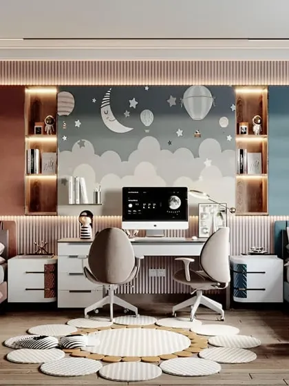 A colorful and creative shared bedroom with a large central desk. The whimsical cloud and hot air balloon mural makes the space feel magical and inspiring.