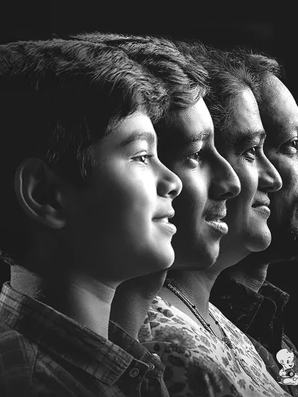 Beyond the colorful themes, I also offer classic family portraits. This black and white profile shot is a powerful way to create a timeless piece of art that focuses purely on the connection between family members.