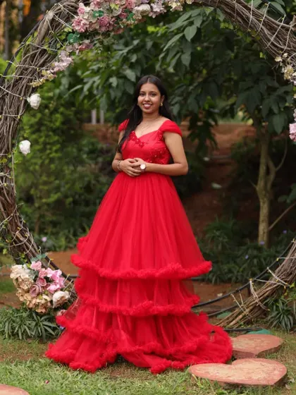 Our happy client chose this beautiful red tiered gown for her pre-wedding photoshoot. The color is bold and romantic, and the fit is perfect.