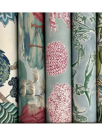 Spruce up your space with these botanical wallpapers from the Ananda collection by Osborne & Little. Featuring lush foliage and exotic flowers, these designs are perfect for creating an accent wall or a fully immersive tropical room.