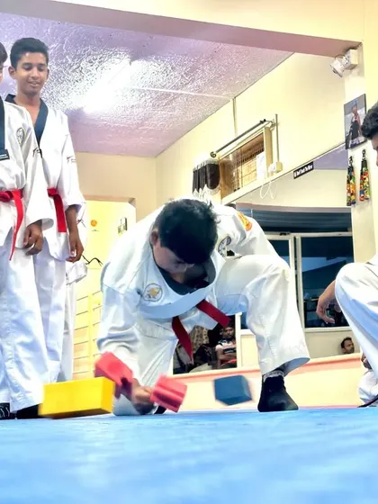A student prepares for his turn at the block-breaking drill.