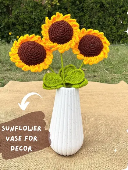 Our crochet sunflowers can also be used as decor. Here they are displayed in a simple white vase, adding a touch of rustic charm to the room.