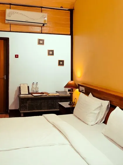 Our rooms blend charming decor with essential amenities, ensuring a peaceful and convenient retreat surrounded by nature.