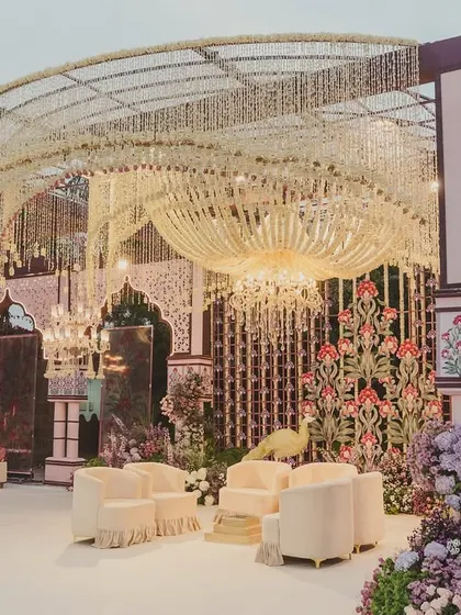 The mandap design for this Udaipur wedding was breathtaking. We created a massive, intricate floral chandelier that cascaded over the ceremony, making the space feel both grand and intimate.