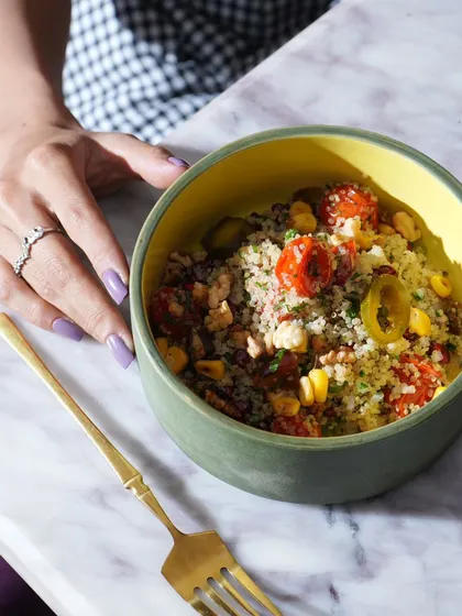 A couscous salad with cherry tomatoes and corn, a light and healthy option from my four-course lunch.