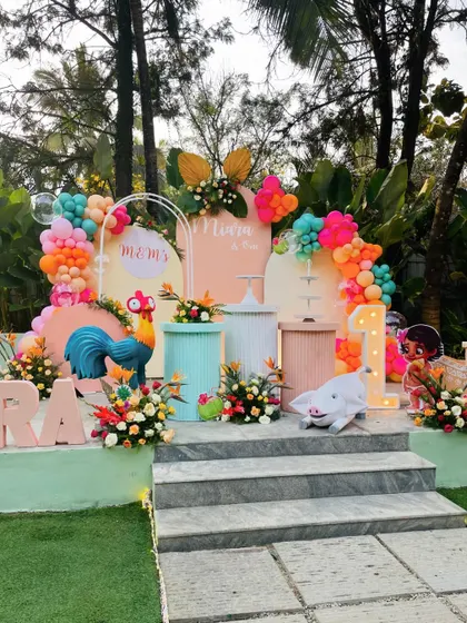Another angle of the Moana party setup, showing the custom-built boat and the "1" marquee light.