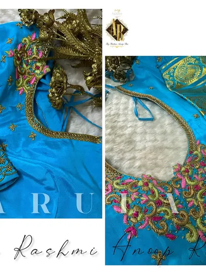 A bright sky blue blouse with multi-color thread embroidery along the neckline. The sleeves have scattered butis and a detailed border for a balanced and festive look.