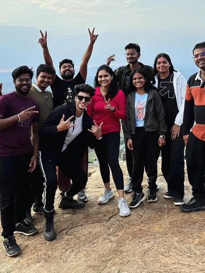 The energy is high after conquering the Skandgiri peak. We foster a fun and supportive atmosphere on all our corporate adventures.