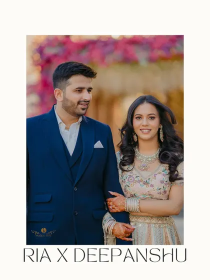An elegant portrait of a newly engaged couple. Their coordinated outfits and confident pose against a floral background make for a classic and beautiful announcement photo.