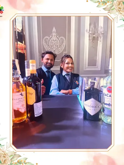 Mixologists Tina and Omkar, representing the skill and professionalism of our team.