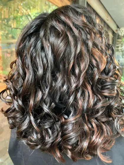 The back view of these bridal curls. The non-bleach color is so rich and beautiful. (No filter)