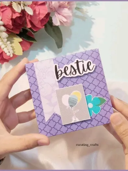 The cover of the "bestie" mini scrapbook, personalized and decorated with cute embellishments.