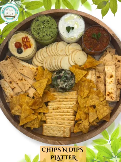Another view of my popular Chip 'n' Dip platter, featuring a variety of crunchy snacks and four different homemade dips. It's a gourmet take on a classic party snack.