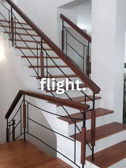 A staircase is more than just a way to get from one floor to another; it's a central feature of a home. We designed this flight with a mix of warm wood and clean black metal for a modern yet timeless look.