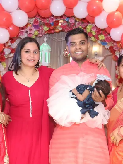 A lovely family portrait with the newborn baby at the center of all the love and attention. Perfect for framing and remembering this special day.