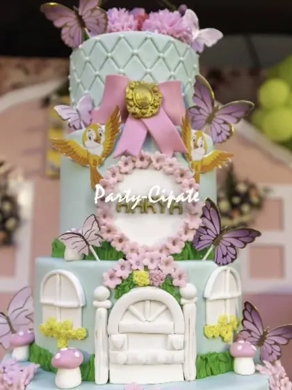The beautiful butterfly-themed cake was the star of the dessert table. The intricate details and soft colors perfectly matched the enchanted forest decor.