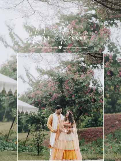 A beautifully framed portrait of the couple under a blooming tree, the soft colors and natural setting creating a fairytale-like image.