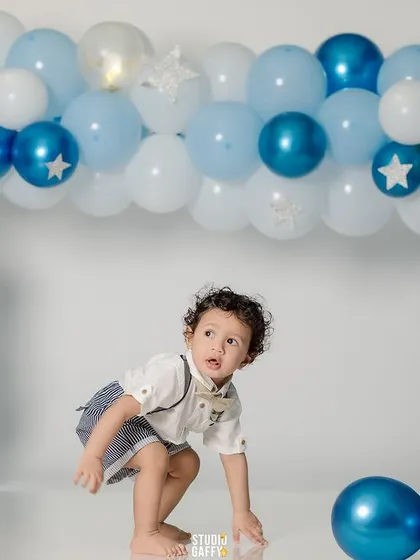 A duplicate of 327, showing the birthday boy ready to play.