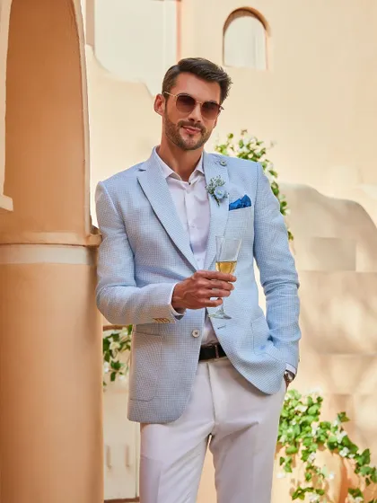 A toast to good times and great style. The Arctic Blue linen jacket is the perfect companion for celebrating life's moments, big and small.