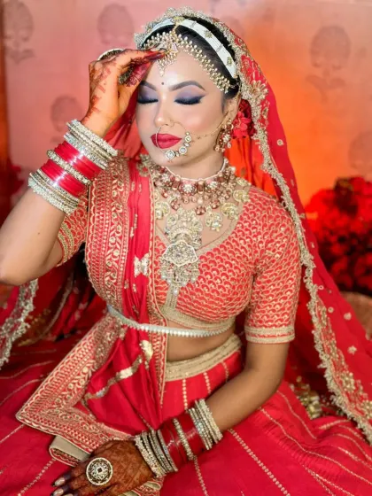 Capturing the perfect bridal portrait is part of the job. This look features a classic red lip and winged liner, a go-to combination for North Indian brides that you will learn to perfect.