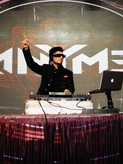 Pointing to the sky, feeling the energy from the crowd. A great DJ set is a two-way street, and I feed off the vibe of the dance floor to deliver the perfect next track.