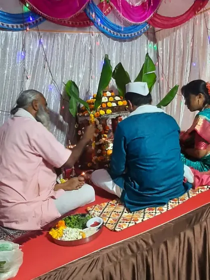 A small, intimate Satyanarayan puja setup at a home. I can provide the seating arrangement and simple backdrop to make the ceremony special.