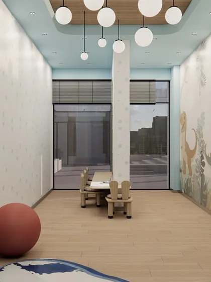 Designing for children requires a special balance of playfulness and practicality. In the crèche for the Shilpa Rathna clubhouse, I used a soft, imaginative wall mural and cheerful colors to spark creativity. The space is designed with safety in mind, featuring rounded forms and durable materials to create a fun and nurturing environment.