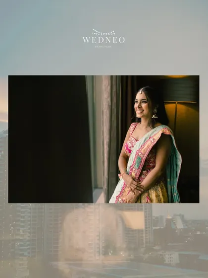 A professionally shot photo of Vidushi against the city skyline. Her mehendi look was designed to be both vibrant and elegant.