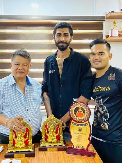 Happy Teacher's Day to my master. Here we are with trophies and awards, a testament to his guidance.