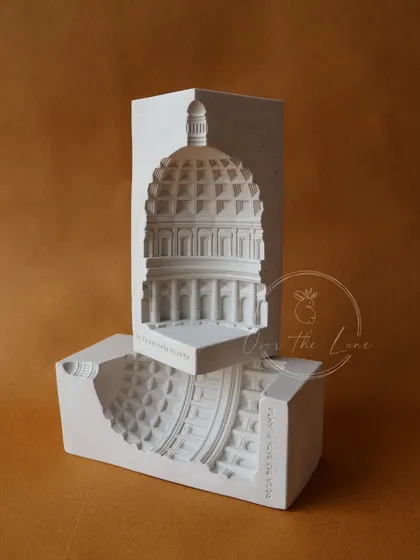 "Every block of stone has a statue inside it..." Here are two halves of my Pantheon eco-resin sculpture, showing how they fit together to create the full dome.