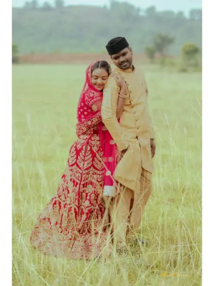 A portrait of a Muslim couple in a beautiful green field. I am experienced in capturing the beauty and tradition of diverse weddings.
