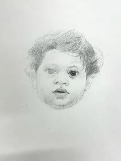 A pencil sketch of my younger son, "Yuvraj." Sometimes a simple sketch can capture the innocence and curiosity of a child in a very direct and honest way.