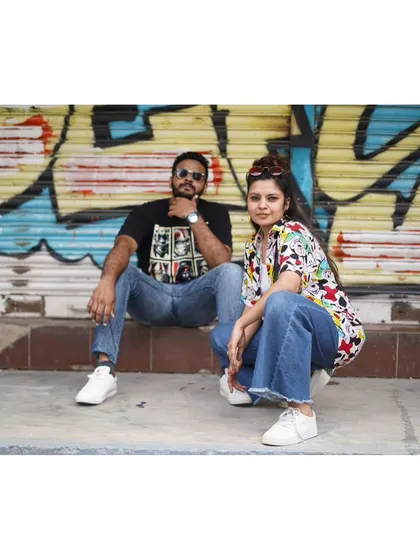 An urban couple portrait with an edge. Using the city's graffiti and architecture as our playground, we created a fun and dynamic shot that reflects their personalities.