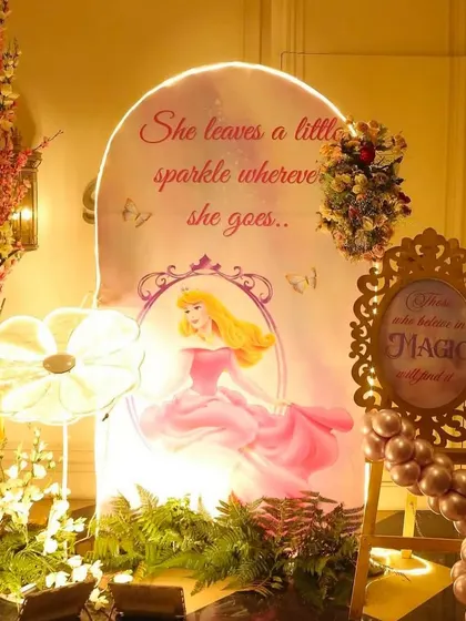 A dreamy princess-themed photo corner. The backdrop features Princess Aurora and a sparkling quote, perfect for magical photos.