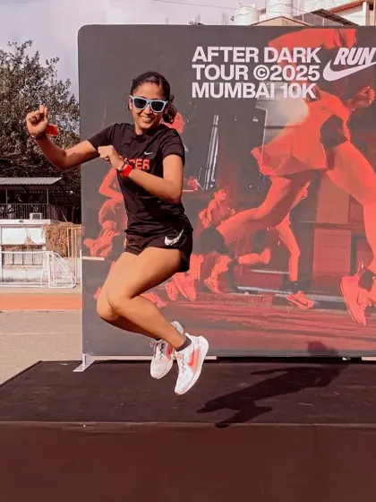 Jumping for joy at a Nike After Dark Tour event. The energy of running with a group of motivated women is absolutely contagious.