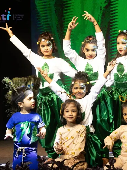 The full cast of the Bhumi (Earth) performance, with trees, animals, and insects all sharing the stage.