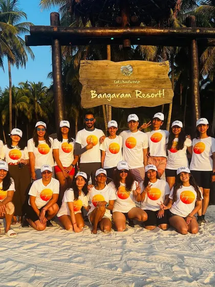 Our amazing 2023 Yoga & Scuba Dive retreat crew at Bangaram Resort. We love building this vibrant and supportive community year after year.