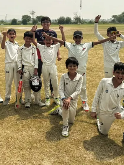 The pure joy and excitement of a team victory. Every player, from the top scorer to the fielder who saved a crucial run, contributed to this success.