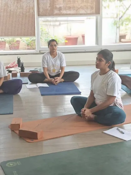 In our TTC, we emphasize the importance of community and shared learning. Students gather for a session on Baddha Konasana (Bound Angle Pose), focusing on hip opening and proper alignment.